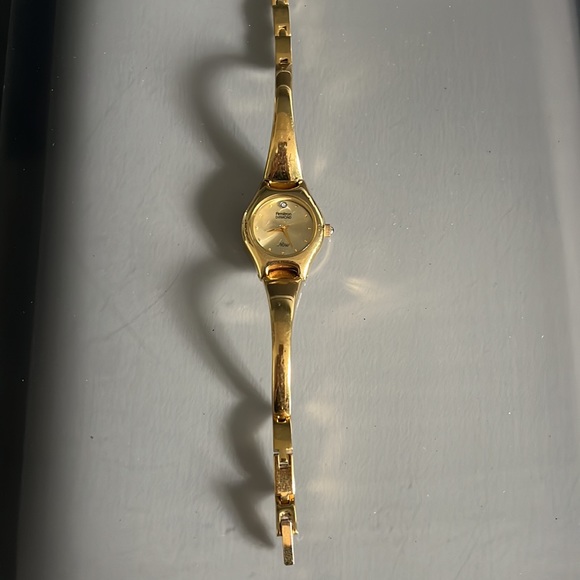 Armitron Now Gold Tone Ladies Bangle Bracelet Watch - Picture 7 of 15